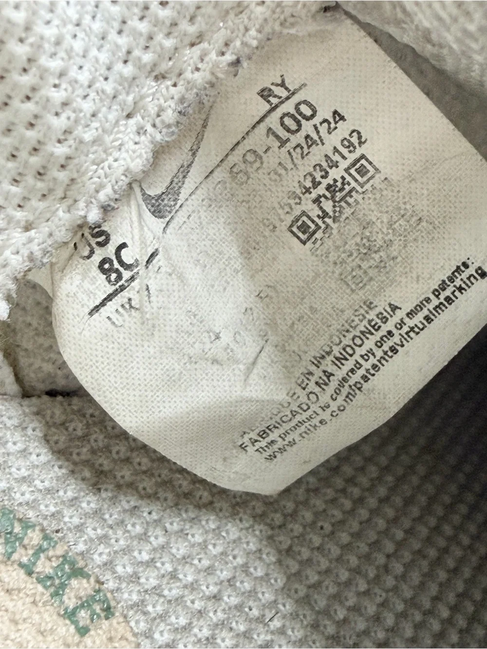 Nike White Kids Sneakers with Dark Green Swoosh